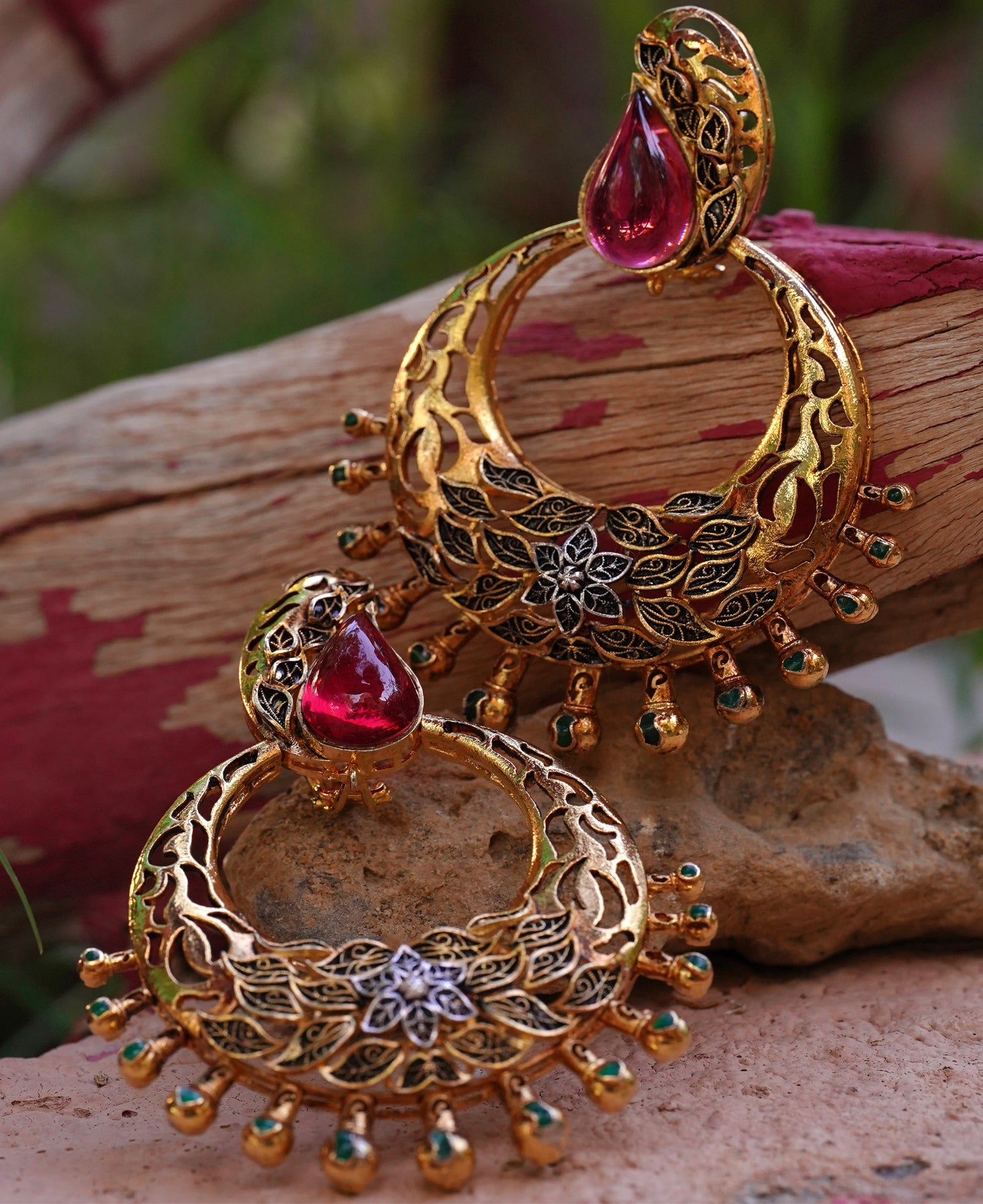 <img src="balis-earrings.jpg" alt="Pakistani silver Balis earrings with gold detailing and naurattan stones" />