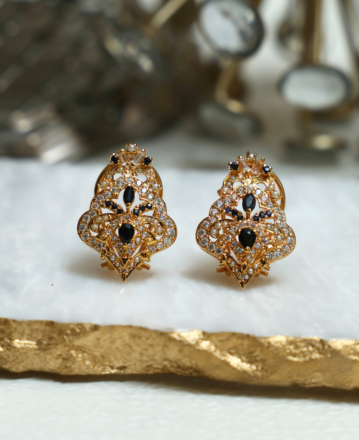 Sapphire and Gold Tops