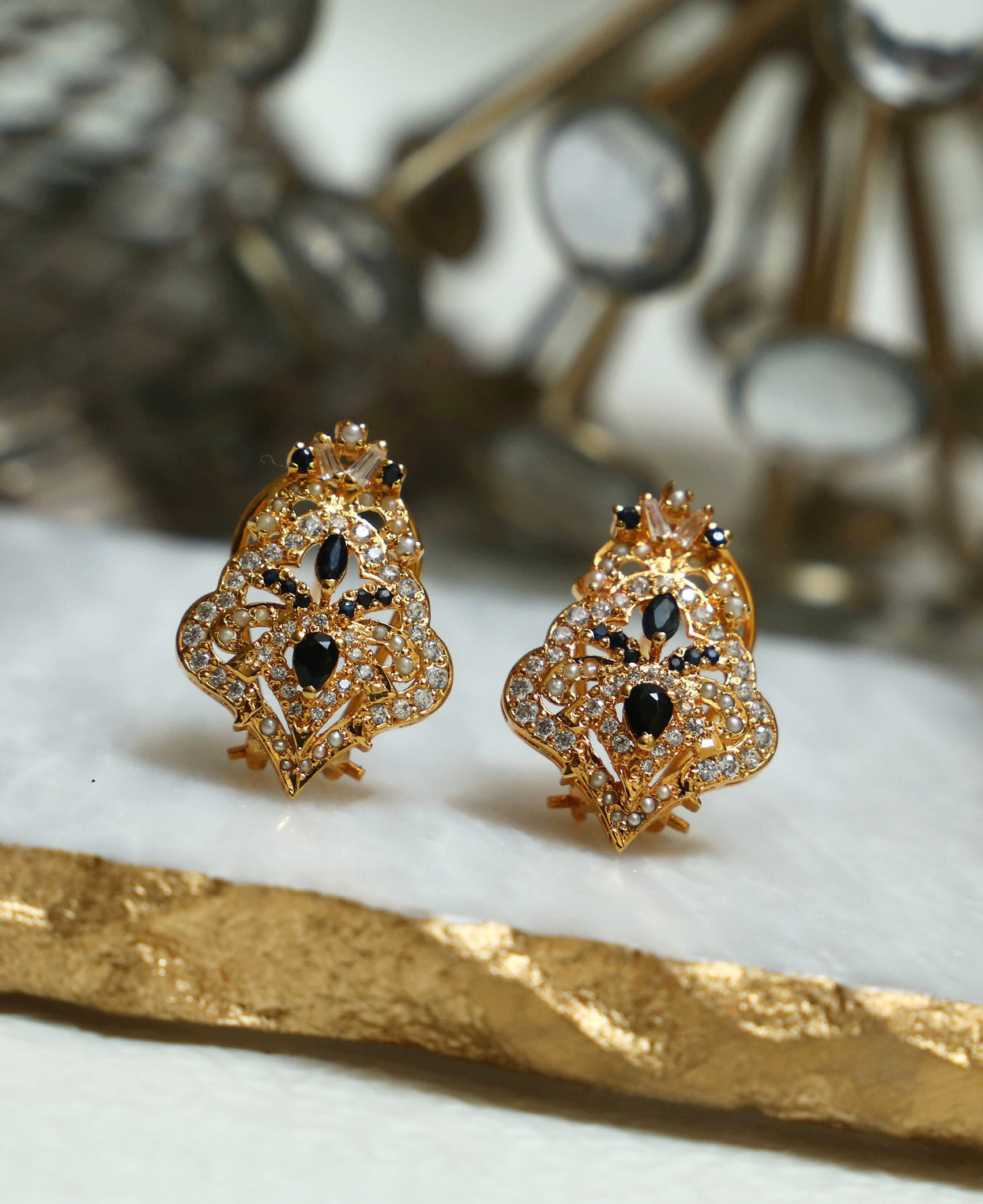 Sapphire and Gold Tops