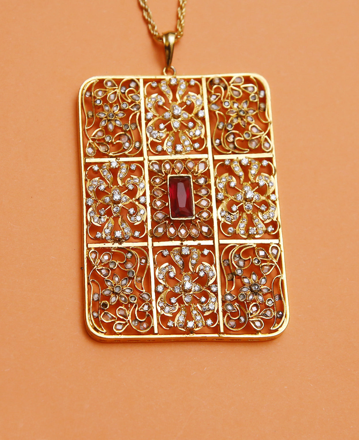 Handcrafted Box Pendant in Treated Rubies and Zircon