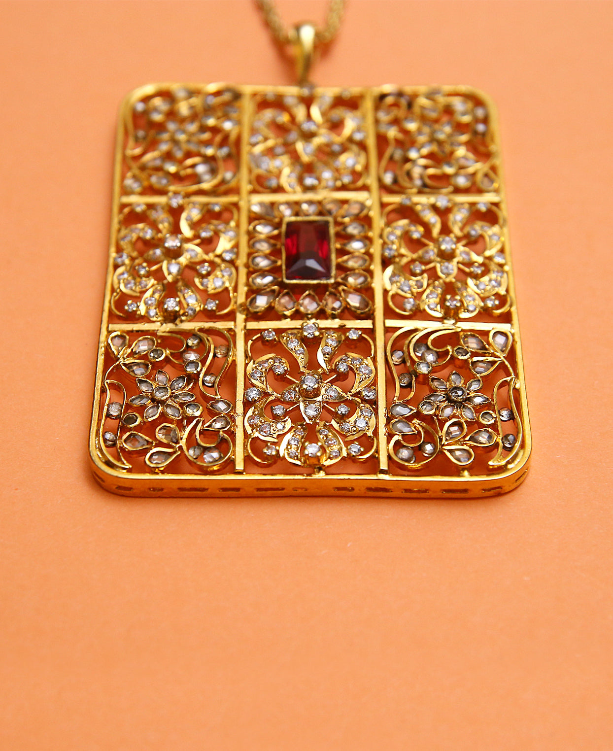 Handcrafted Box Pendant in Treated Rubies and Zircon