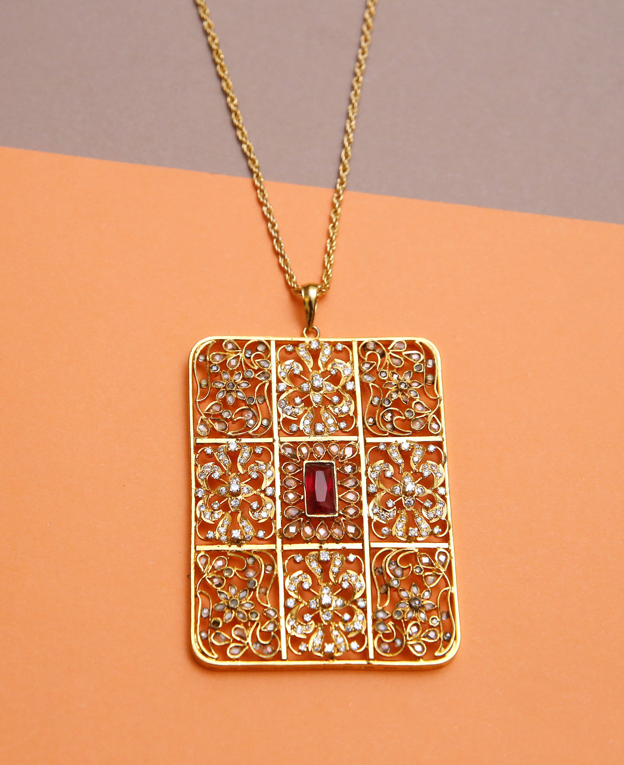 Handcrafted Box Pendant in Treated Rubies and Zircon